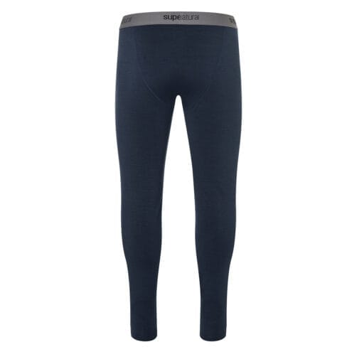 Baksidan av underställsbyxorna super.natural Base Tight 230 i navy.