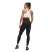 Röhnisch Thermal Tights (dam) bakifrån på en modell.