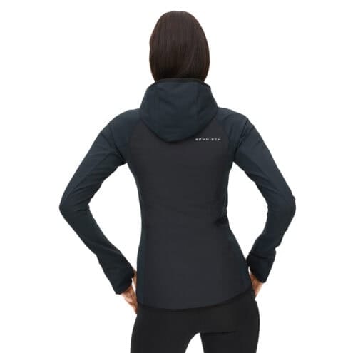 Free Motion Padded Jacket, Black som står med ryggen mot kameran