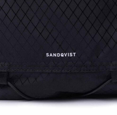 Logga på framsida av Närbild på innerfack av Sandqvist Nils