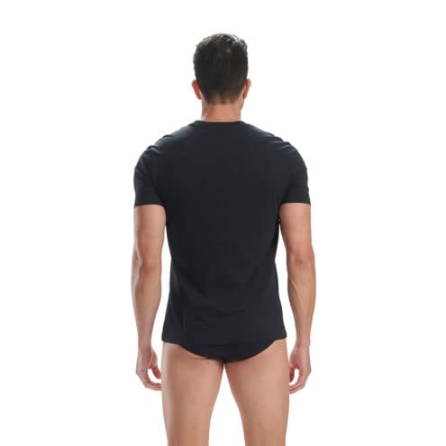 En modell bär Adidas Crew Neck T-shirt 2-pack och vänder ryggen