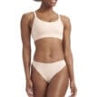 En modell bär Adidas Scoop Lounge Bra med matchande topp
