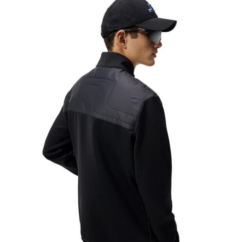 Baksida av En snygg och skön J.Lindeberg Martino Quilt Hybrid Jacket (herr)