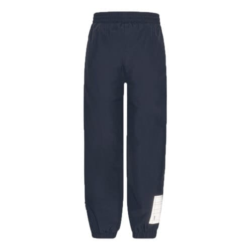 Ett par praktiska och varmfodrade Molo Wild fodrad regnbyxor (barn/junior) i navy - bakifrån
