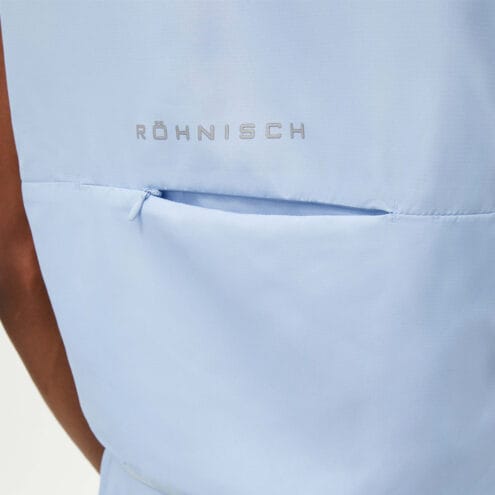 En praktisk och ventilerande Röhnisch Lightweight Running Vest (dam) med ventileringsficka i ryggen