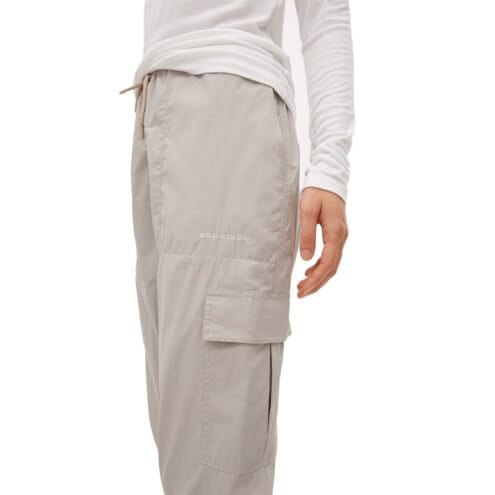 Fickor på ett par Sköna och skyddande Röhnisch Frankie Wind Pants vindbyxor (dam)