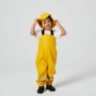 En pojke har på sig Tretorn Kids Wings Rain Hat (barn)