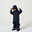 Hela kitet till Tretorn Kids Wings Rain Hat (barn) på en pojkmodell