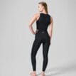 baksida av Casall Crease High Waist Tights träningstights (dam) på en modell