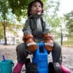 Reima Rain mittens Puro regnvantar (barn)på ett barn