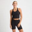 framsida av Röhnisch Ribbed R Tank träningslinne (dam) på en modell