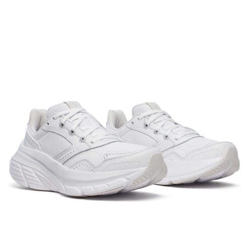 två stycken Saucony Guide Metro leather sneakers (dam) snett framifrån
